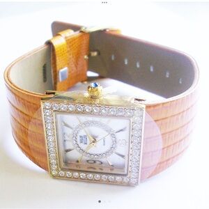 Orange Leather Banded Goldtone Crystal Nolan Miller Watch
